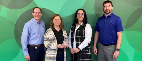 The Dieterich Bank team poses with their 2020 Commitment to Excellence Award.